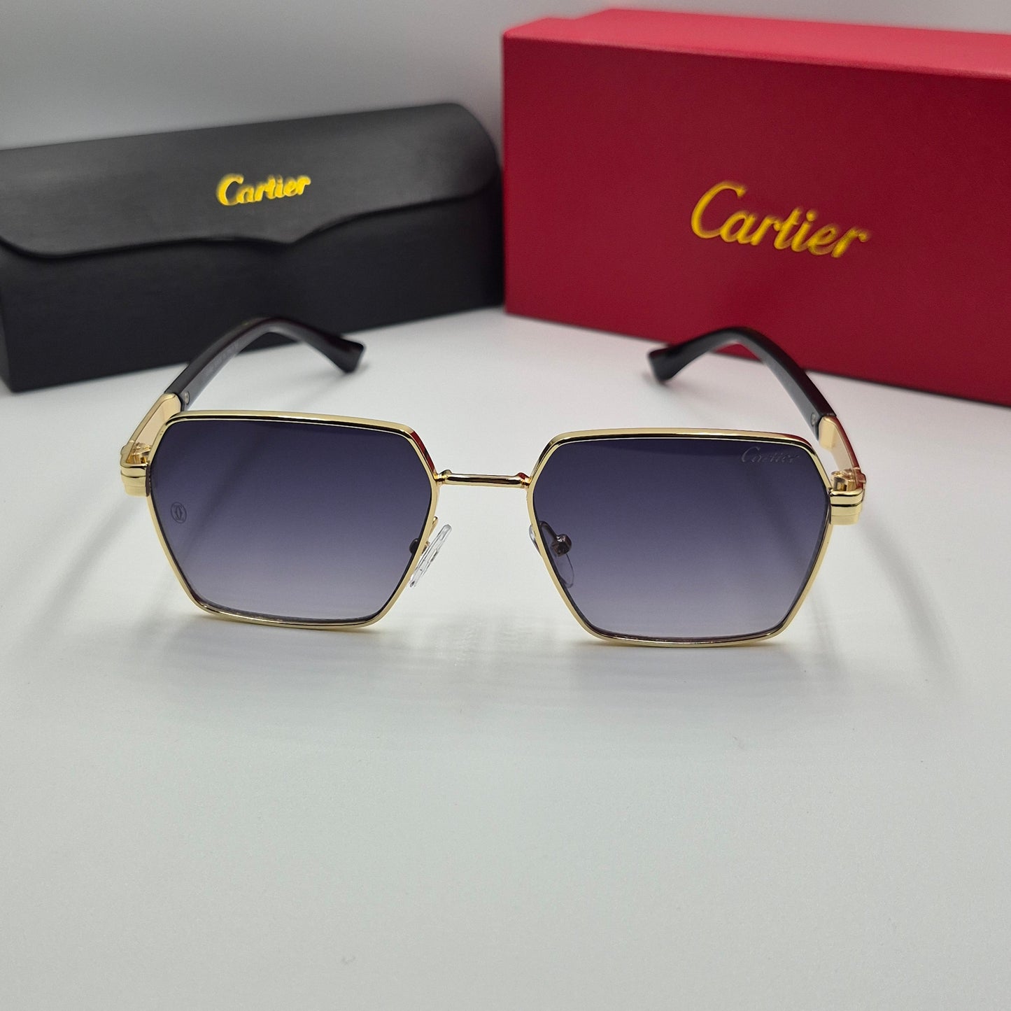Solaires: CARTIER doré noir