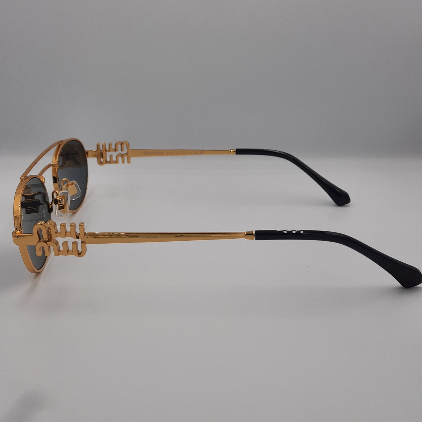Solaires: MIUMIU SMU54ZS Noir/GOLD