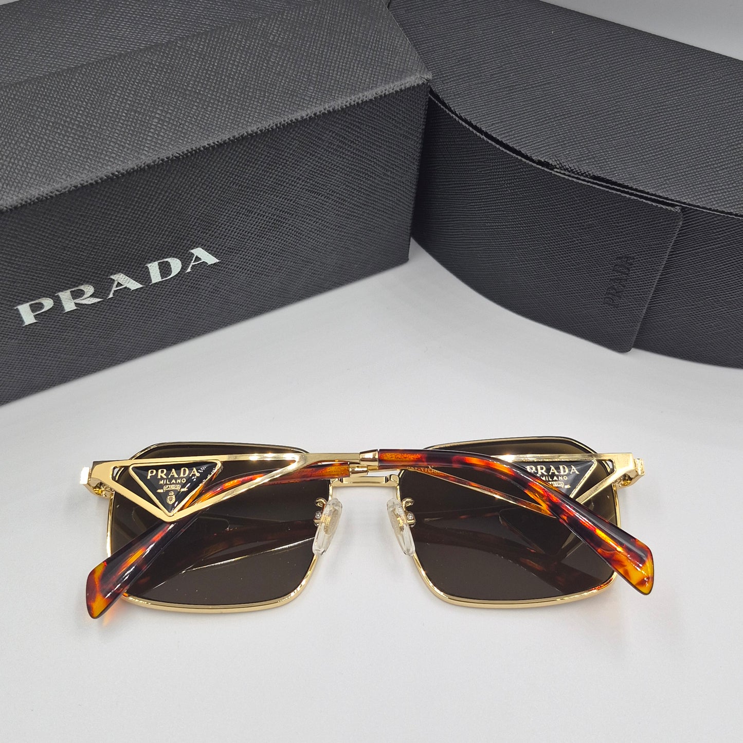 Solaires: PRADA PRA51V doré marron havane