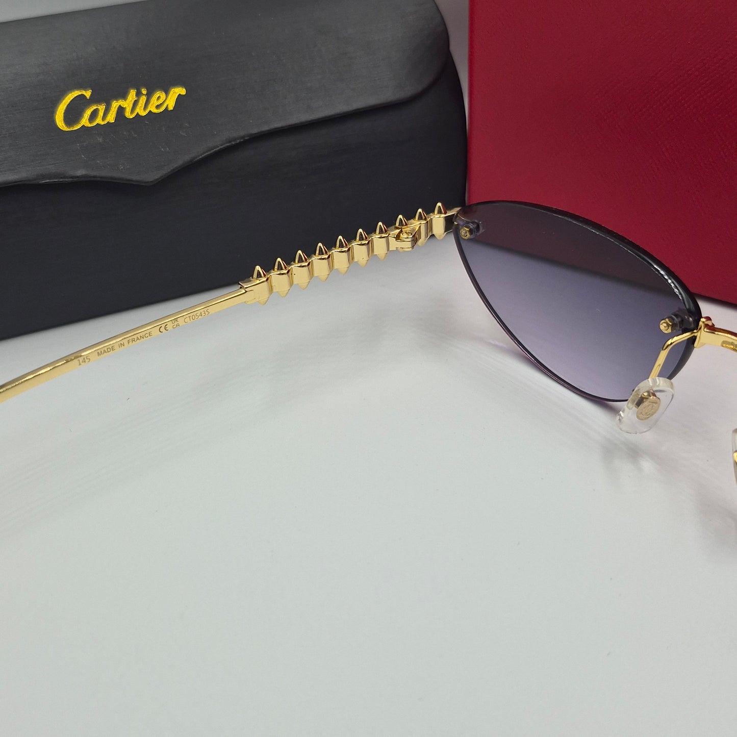 Solaires: CARTIER CLASH CT0543S doré noir deg
