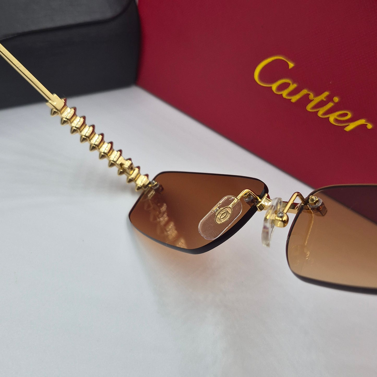 Solaires: CARTIER CLASH CT0544S doré marron