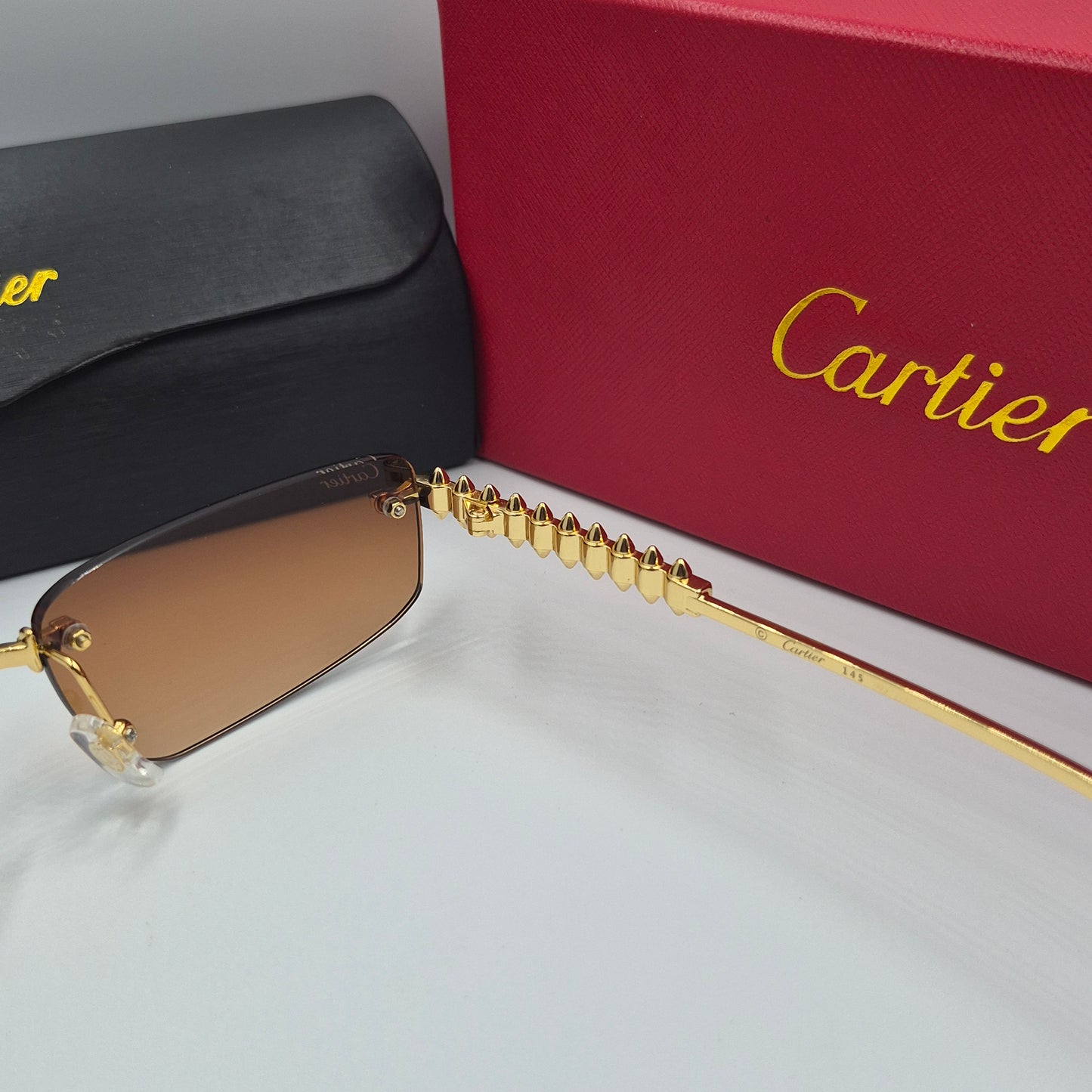 Solaires: CARTIER CLASH CT0544S doré marron