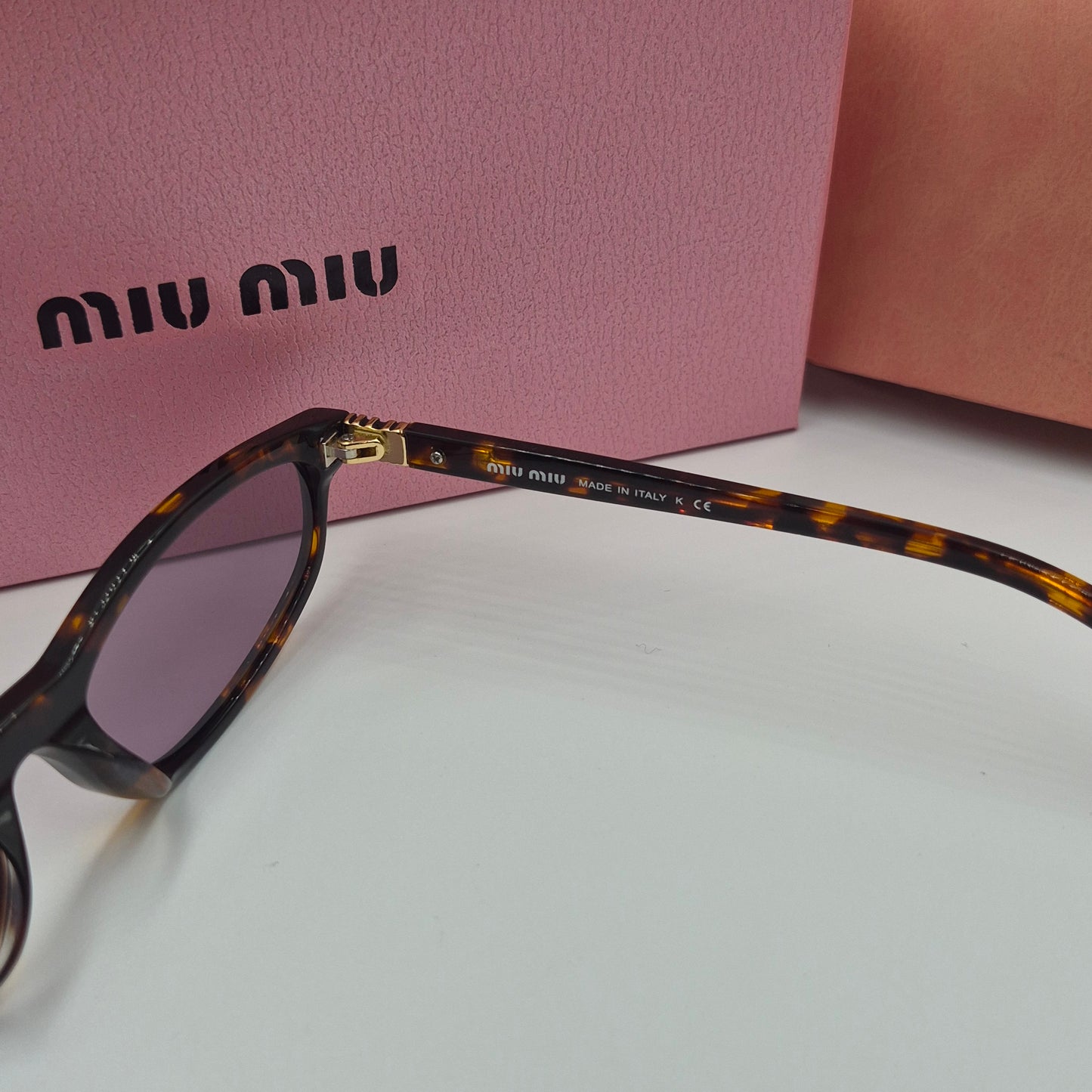 Solaires: MIUMIU SMU06S violet havane